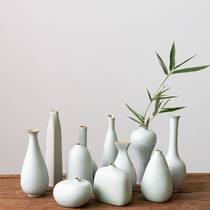 Ceramic Yu white glazed small vase Japanese flower plug in a small bottle creative piece of a simple tea table tea ceramic flower flower