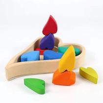 Toy building blocks and puzzle children rainbow teaches stacked buns to assemble the treasure to assemble the girl to make wood