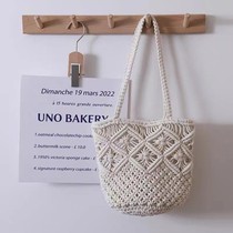 Literary and simple cotton thread shoulder woven bag new summer niche hollow straw bag hand-held womens bag vacation beach bag