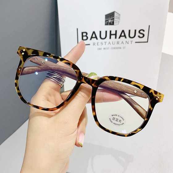2024 new TR wood grain temple anti-blue light glasses retro simple transparent flat glasses frame 30128
2024 new TR wood grain temple anti-blue light glasses retro simple transparent flat glasses frame 30128