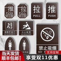 Mens and womens toilets toilet signage sliding door glass door careful steps sliding meeting there is a monitoring warning sign no smoking warning sign door sign