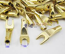 Large gold-plated wiring fork