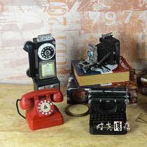 A variety of retro resin model ornaments Antique old telephone radio typewriter camera decorative props