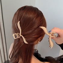 Japan's substitute BM large pearl grabbing female high-end hair clip head chuckle hair chuckle hair chuckle