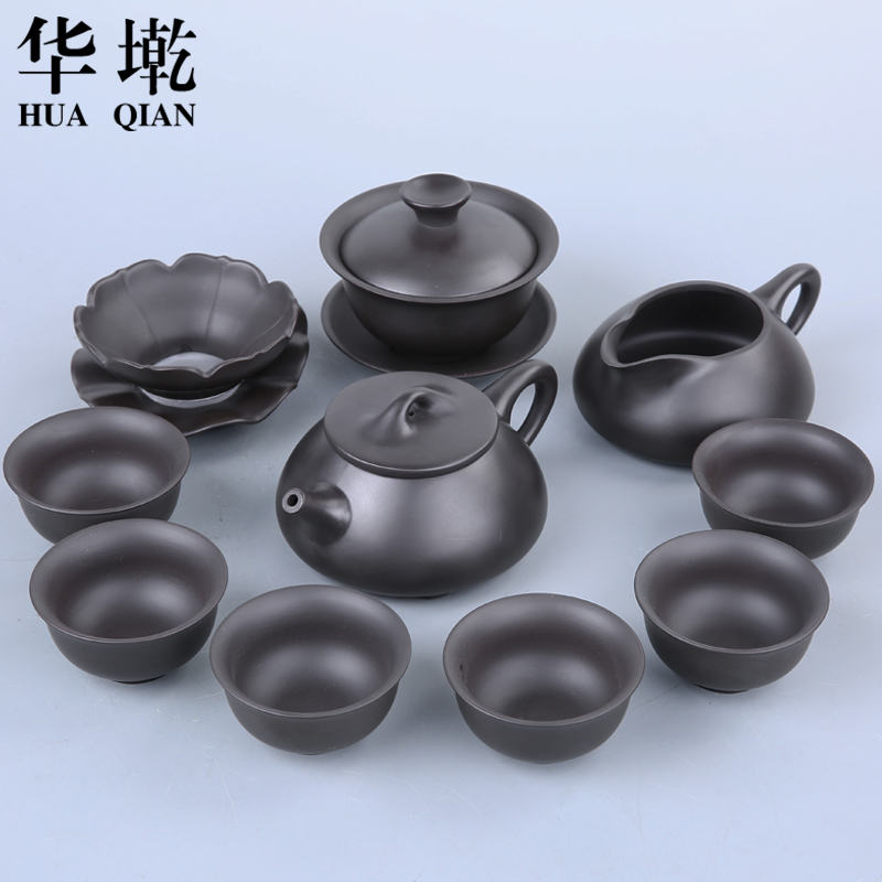 China Qian violet arenaceous kung fu tea set suit household black pottery yixing manual it a complete set of tea cups to wash the tea taking