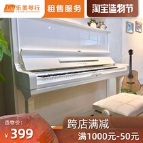 White pianist with Yamaha Japan imported used YAMAHA U3H graded upright piano rental