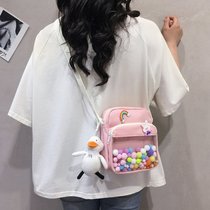2021 summer new Japanese cute funny personality color fur ball transparent small bag soft sister student messenger bag