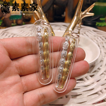 Vegetarian family Thailands Buddhist dragon lady Ben peanuts pendants