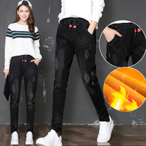 Fat mm size elastic waist plus velvet padded casual jeans women loose Korean version of broken hole with velvet slim Haren pants