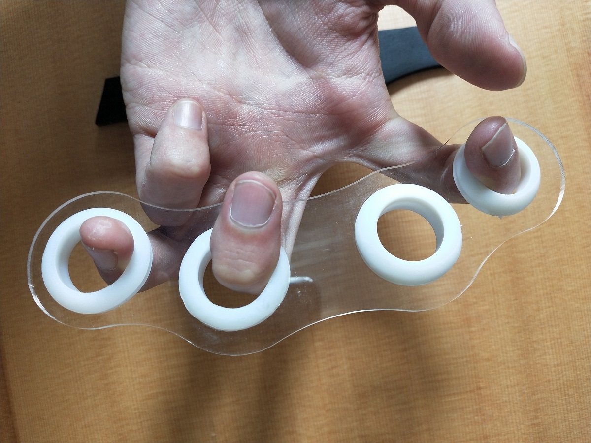 电木吉他扩指器手指扩张分指开指音阶跨度练习指套乐器配件指力器