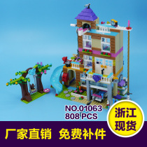  01063 Friendship Club Heart Lake City Friends series girls assembling and inserting building block toys