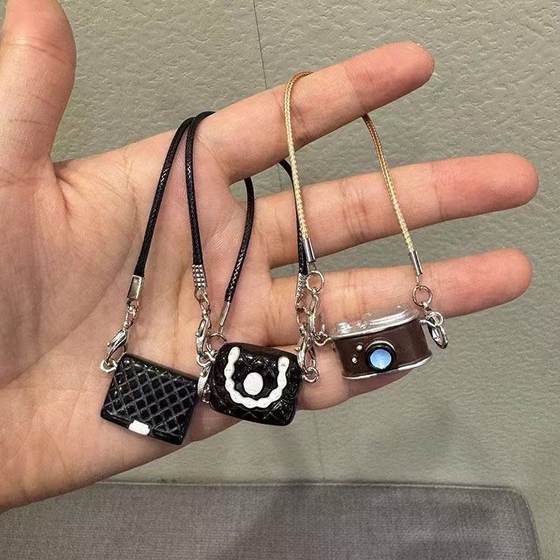 Dollhouse mini model camellia black and white bag camera accessories doll labubu pendant
Dollhouse mini model camellia black and white bag camera accessories doll labubu pendant