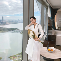 White suit collar double-row buttoned with dress with small crowdsourced design feel slim irregular pleated skirt