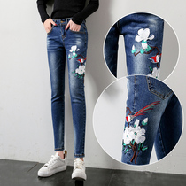 High-waisted jeans womens embroidered flower feet spring and autumn 2021 new slim nine-point stretch thin pants