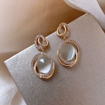 Elegant name Yuanyan ~ Advanced feeling goddess ~ light extravagant earrings female pure silver cat eye stone anti-allergy New tide temperament Chaos