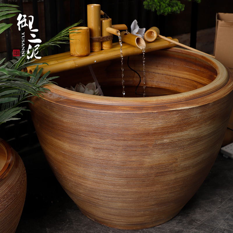 Ceramic coarse pottery courtyard garden aquarium manual landing circle places heavy tank brown wood grain texture lines furnishing articles