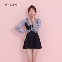 One-piece swimsuit female summer conservative 2021 new hot spring thin belly cover fairy fan skirt style flat corner swimsuit women