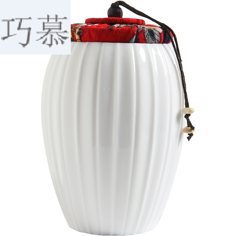 Qiao mu built dehua white porcelain ceramic tea as a jar of household mini small pu seal pot of tea