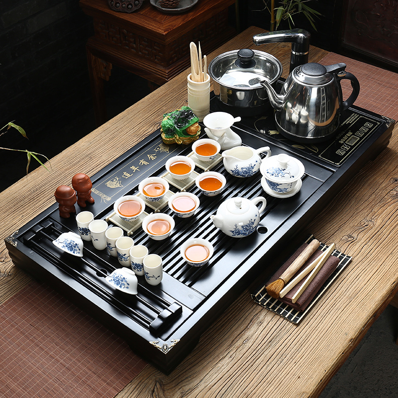 Sand embellish ceramic purple Sand tea set ice crack kung fu tea set a complete set of four solid wood tea tray and induction cooker