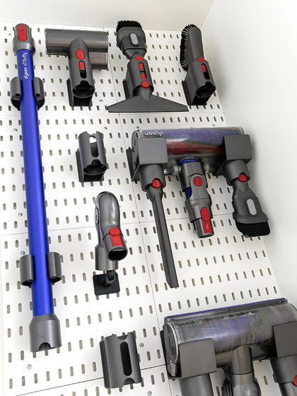 Putting tool cabinet on the cave wall to adapt the Dyson storage rack Putting tool cabinet on the cave wall to adapt the Dyson storage rack