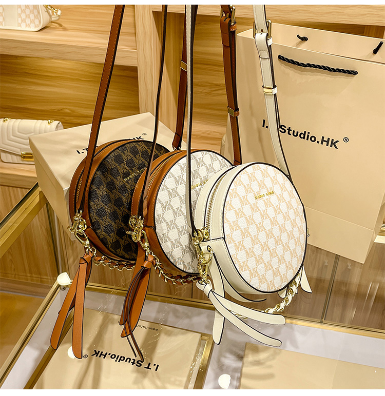 mk圆饼包包2022新款潮时尚夏季真皮单肩斜挎圆形链条手提小圆包女