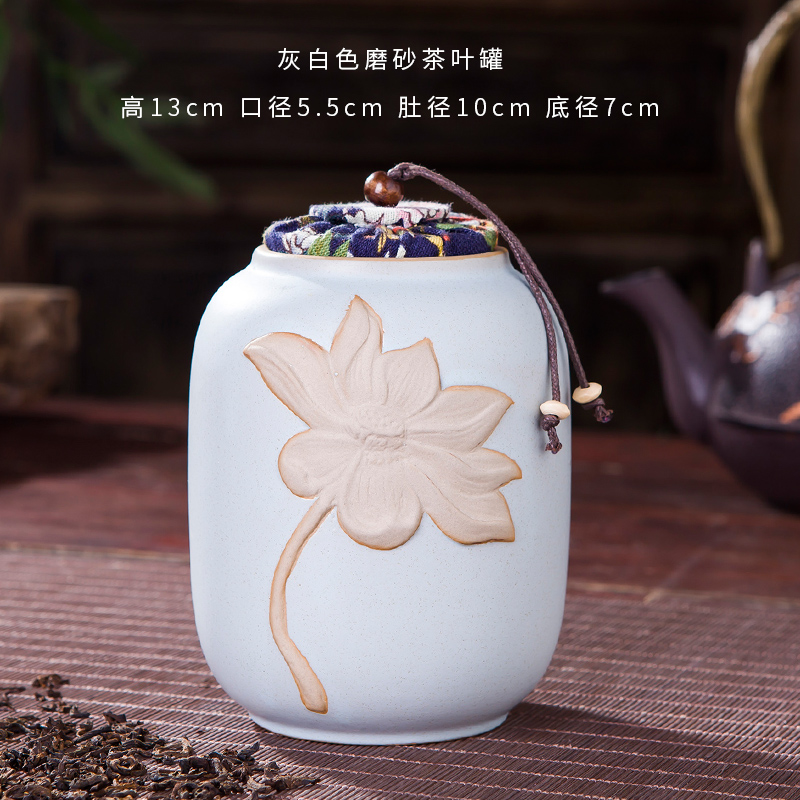 Jingdezhen embossed lotus checking ceramic tea caddy fixings warehouse sealed barrels of pu 'er tea to wake two POTS of cloth cover 4