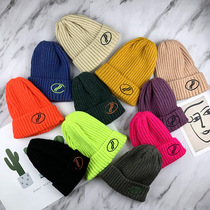 Childrens hat Korean fluorescent color knitted hat for men and women baby candy color wool hat Joker letter cap tide