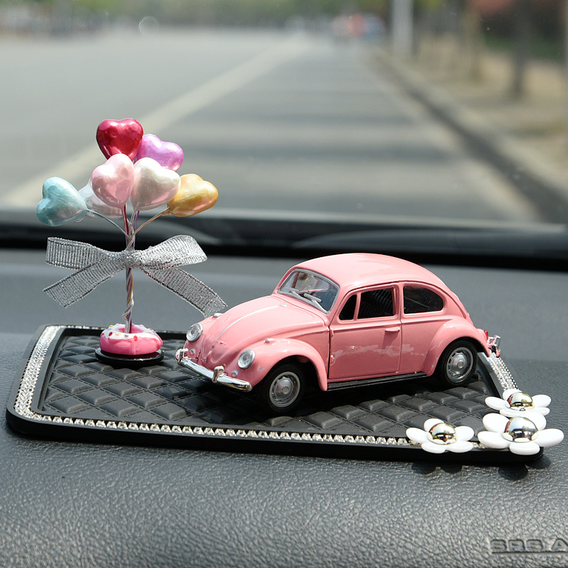 car dashboard doll