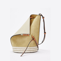 Star 2023 new Han - style leather female package texture fashion grass decorated bucket bag shoulder slope bag bag