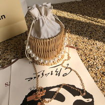 Bamboo basket bag women 2021 New Pearl handheld woven net red crossbody Joker rattan bucket bag straw bag