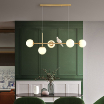 Nordic ins restaurant chandelier modern simple creative personality Angel Bird light luxury long strip table magic bean lighting