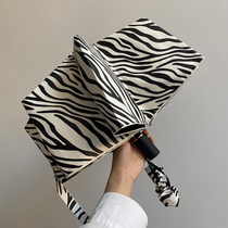 Upgrade with 3fter zebra automatic umbrella female sun-shading three-fold clear and rainy sun and black rubber sun umbrella