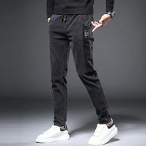 Hong Kong high-end plus velvet padded jeans men's tide brand autumn and winter black slim feet men's casual long pants
