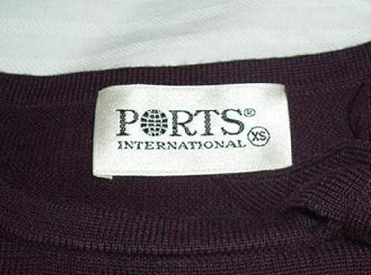 衣服上的商标,为啥一定要放在脖子后面?