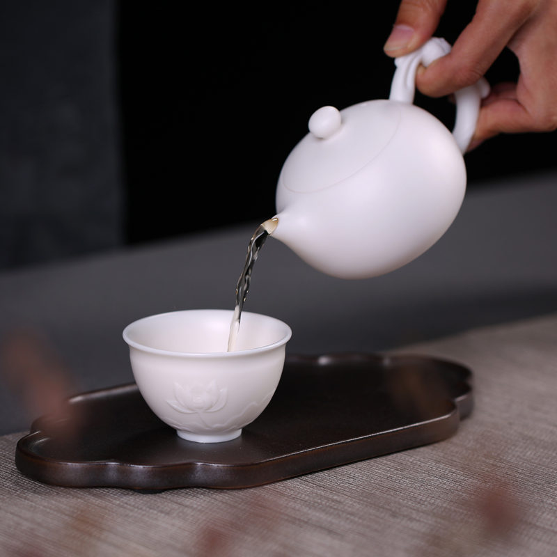 The Master artisan fairy dehua white porcelain tea set manually kung fu tea cups to suggest the sample tea cup masters cup single glass cup