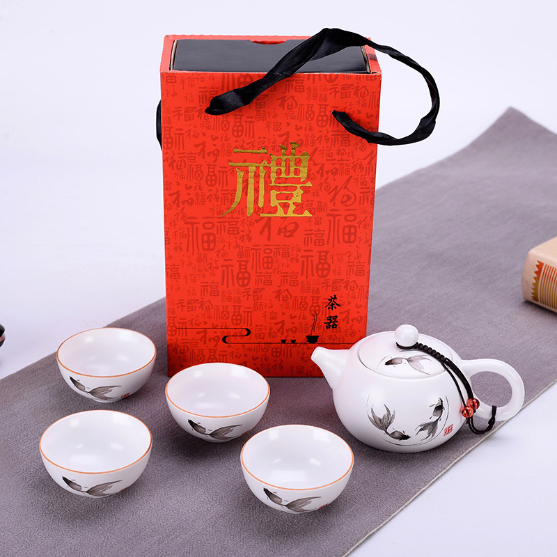 Creative ceramic kung fu tea set a pot of four cups of tea gift box home portable up with inferior smooth travel kit