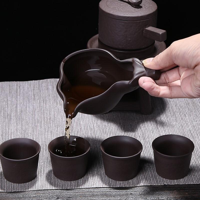 The Tea set with violet arenaceous stone mill creative automatic ceramic kung fu Tea teapot teacup lazy mercifully s