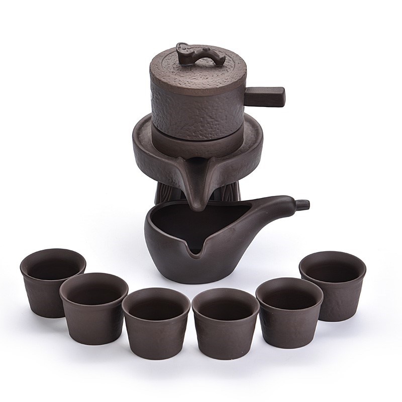 Tea set home stone mill creative ceramic teapot kung fu Tea cup half full automatic ⒅ ⒅.