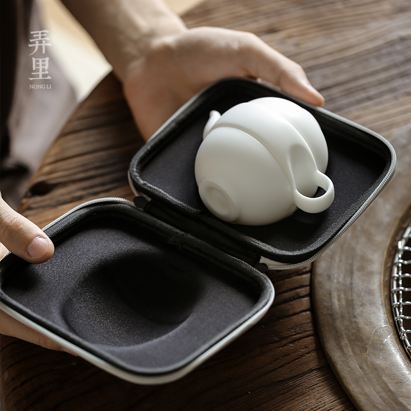 Travel tea set ceramic cups kung fu dehua white porcelain cup to crack a pot of two cups of Japanese portable teapot