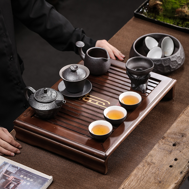 By Japanese kung fu tea set tea tray household contracted ceramic cups of a complete set of coarse pottery teapot tea set
