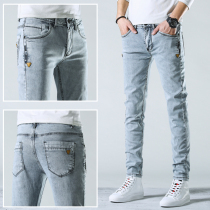 Hong Kong spring new light-colored jeans mens trend brand wild slim-fit pants elastic youth light gray long pants