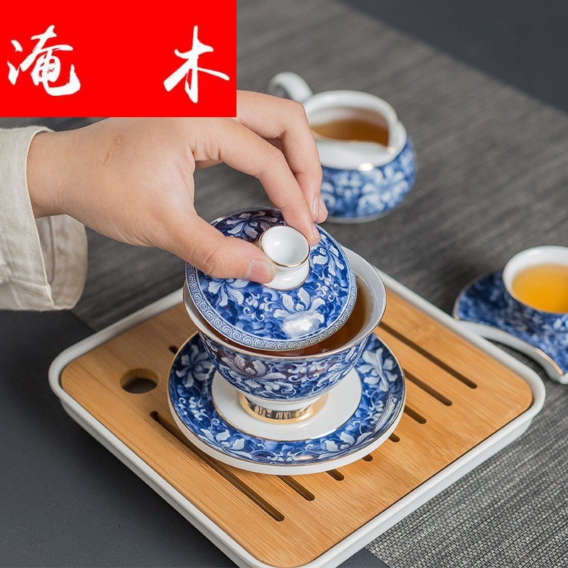 Submerged wood three just tureen large blue and white porcelain ceramic cups great kung fu tea set against the very hot tea to the bowl