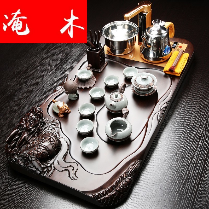 Flooded the whole piece of ebony wood tea tray was the home of a complete set of violet arenaceous kung fu tea set four unity induction cooker tea set