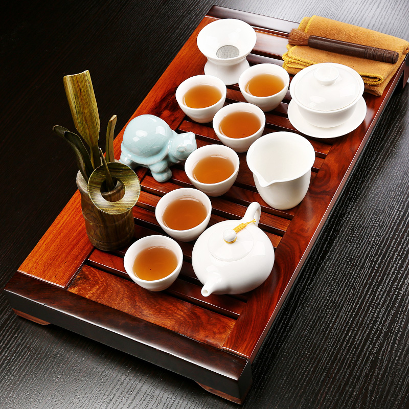 NiuRen purple ceramic kung fu tea set suit household contracted office hua limu tea tray was the draw - out type tea table set