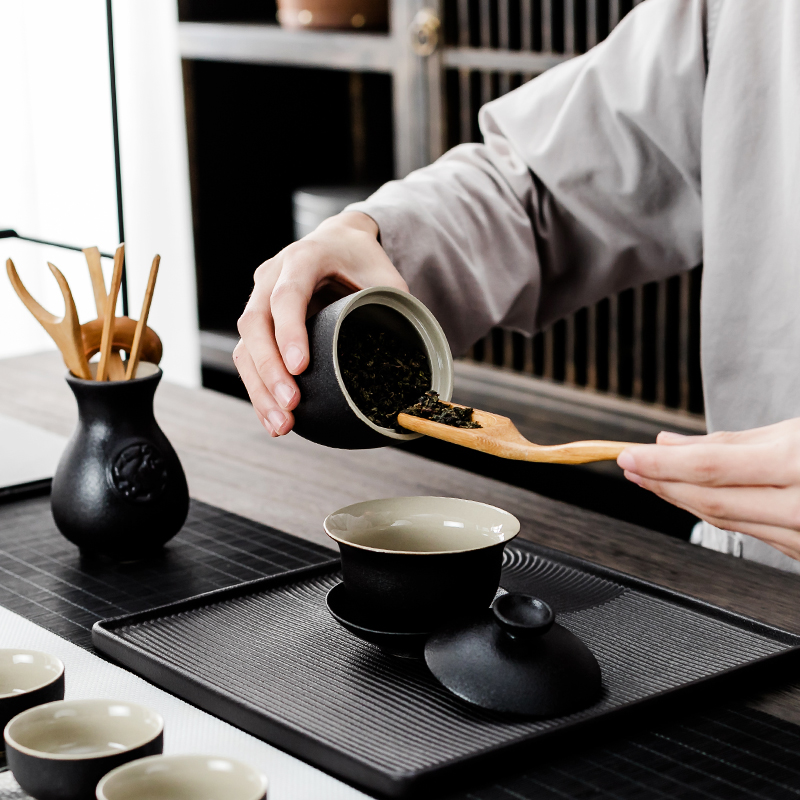 NiuRen household contracted and I sitting room office black pottery teapot teacup Japanese kung fu of a complete set of ceramic tea set