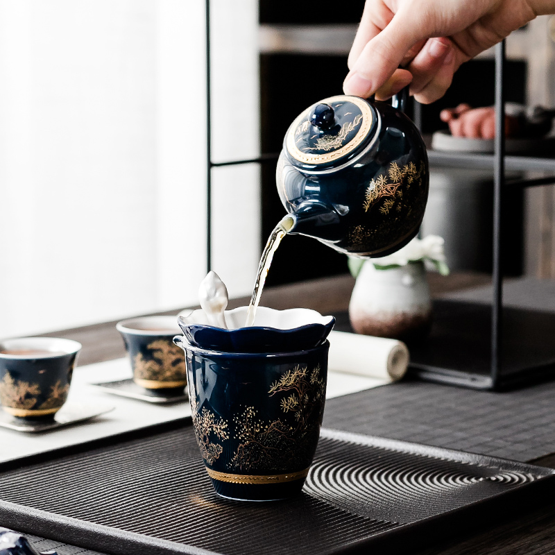 NiuRenLiu silver kung fu tea set suit household teapot teacup of blue and white porcelain ceramic office gift of a complete set of tea sets