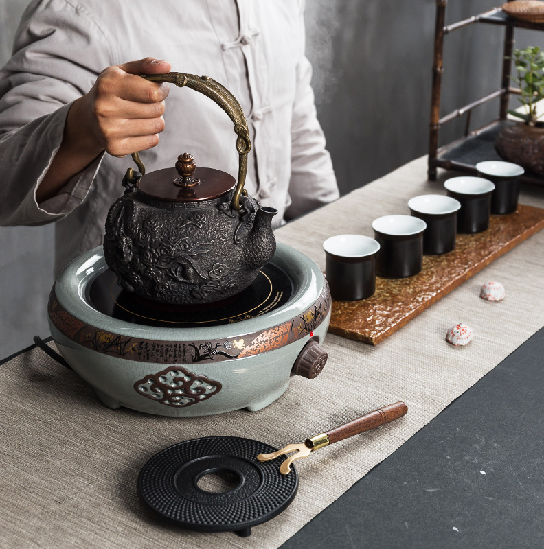 NiuRen iron pot of boiled tea exchanger with the ceramics cast iron teapot kettle electric TaoLu tea stove cooking pot boiling kettle by hand