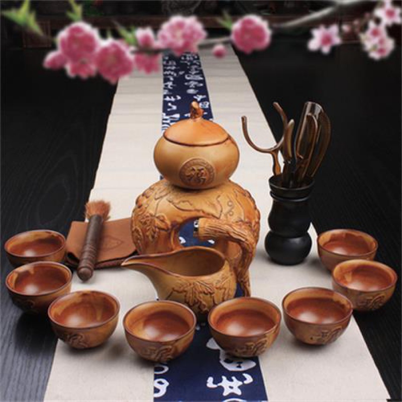 Stone ground tea purple sand tea set automatic tea sets ceramic lazy all semi - automatic zisha teapot tea