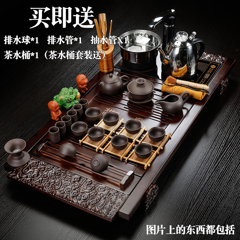 Back on solid wood tea tray was four unity of household ceramic kung fu tea set of a complete set of automatic tea set