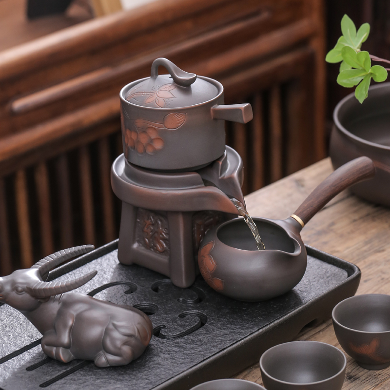 Purple ceramic tea set home sitting room of Chinese style restoring ancient ways of high - end ceramic automatic storage lazy people make tea cups